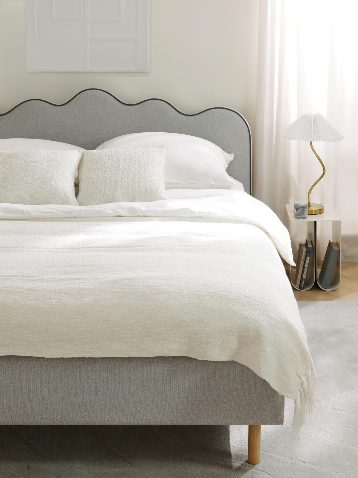 Romatta Upholstered Bed with Wavy Headboard